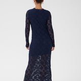 Navy lace dress worn by a model on a white background