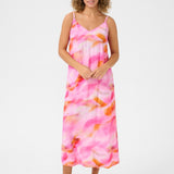 Experience cool comfort in our Cream Nana Slip Dress. This cheerful piece is perfect for any casual occasion, offering a relaxed and effortless style. Stay stylish while feeling at ease in this must-have dress.