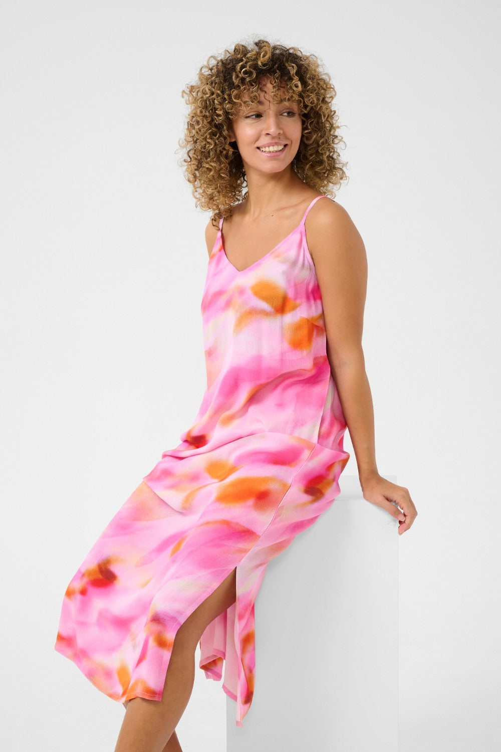 Experience cool comfort in our Cream Nana Slip Dress. This cheerful piece is perfect for any casual occasion, offering a relaxed and effortless style. Stay stylish while feeling at ease in this must-have dress.