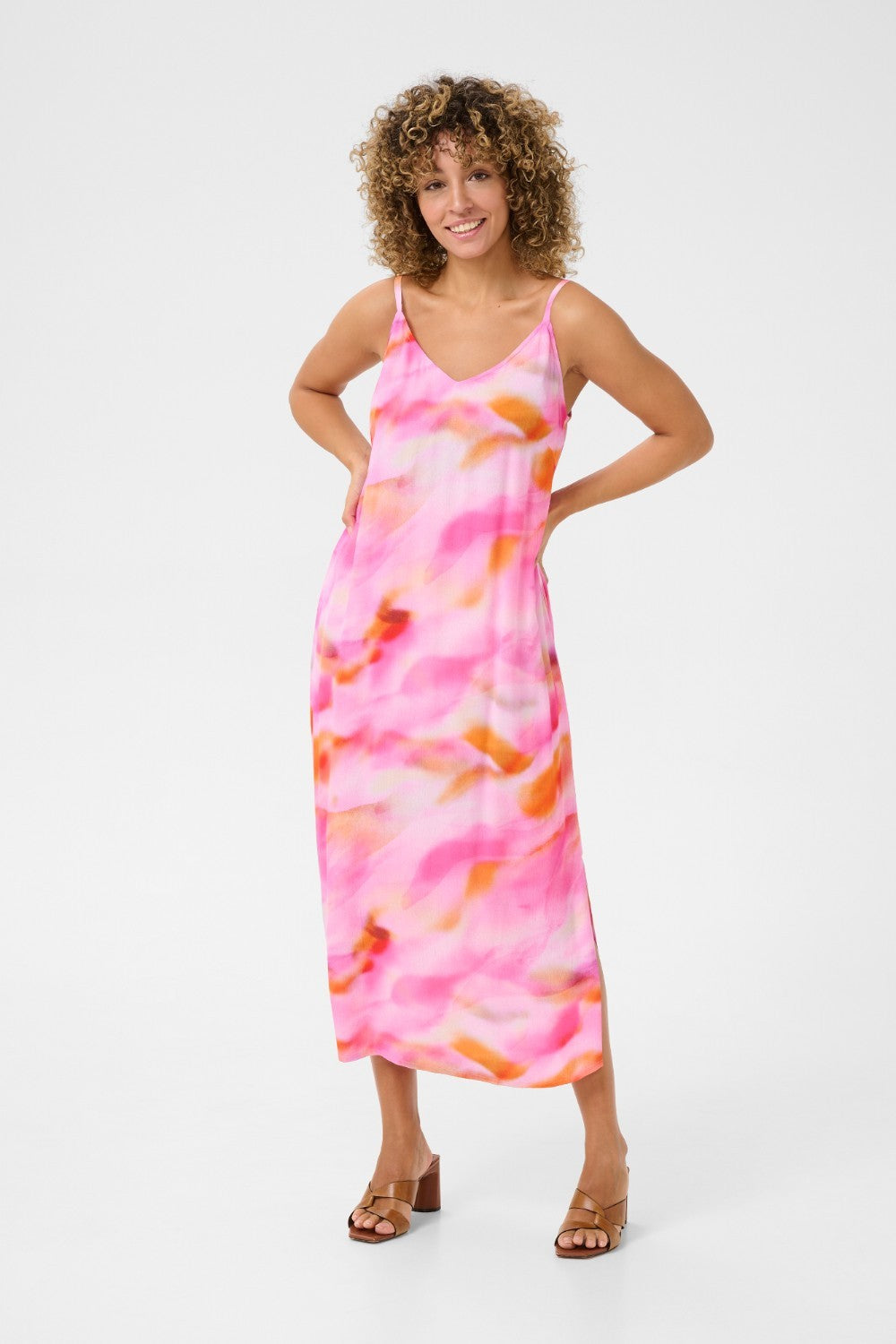 Experience cool comfort in our Cream Nana Slip Dress. This cheerful piece is perfect for any casual occasion, offering a relaxed and effortless style. Stay stylish while feeling at ease in this must-have dress.