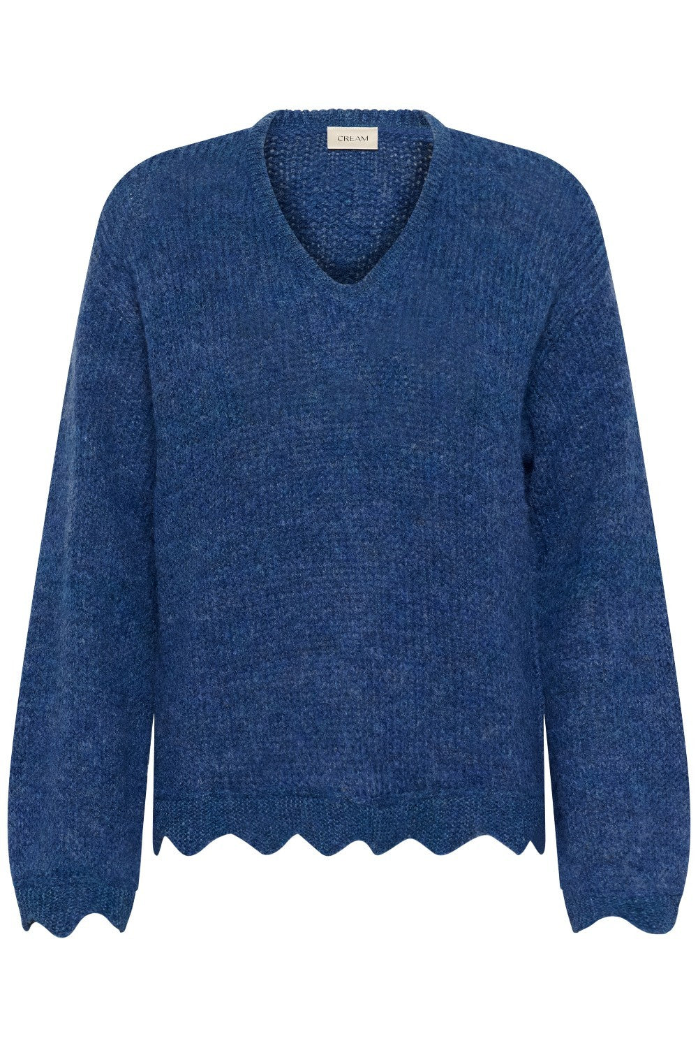 Blue sweater with scalloped hem on a white background