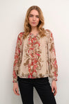 Look and feel your best in the enchanting Cream Noviba Blouse. The airy and lightweight fabric will keep you feeling comfortable and looking effortlessly stylish.
