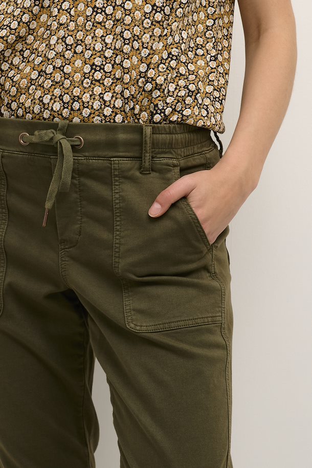 Introducing the Cream Nuka Jogdenim Cargo Pant! With its unique jogger style and comfy cargo pockets, you'll be ready to jog, jump, and explore in style.