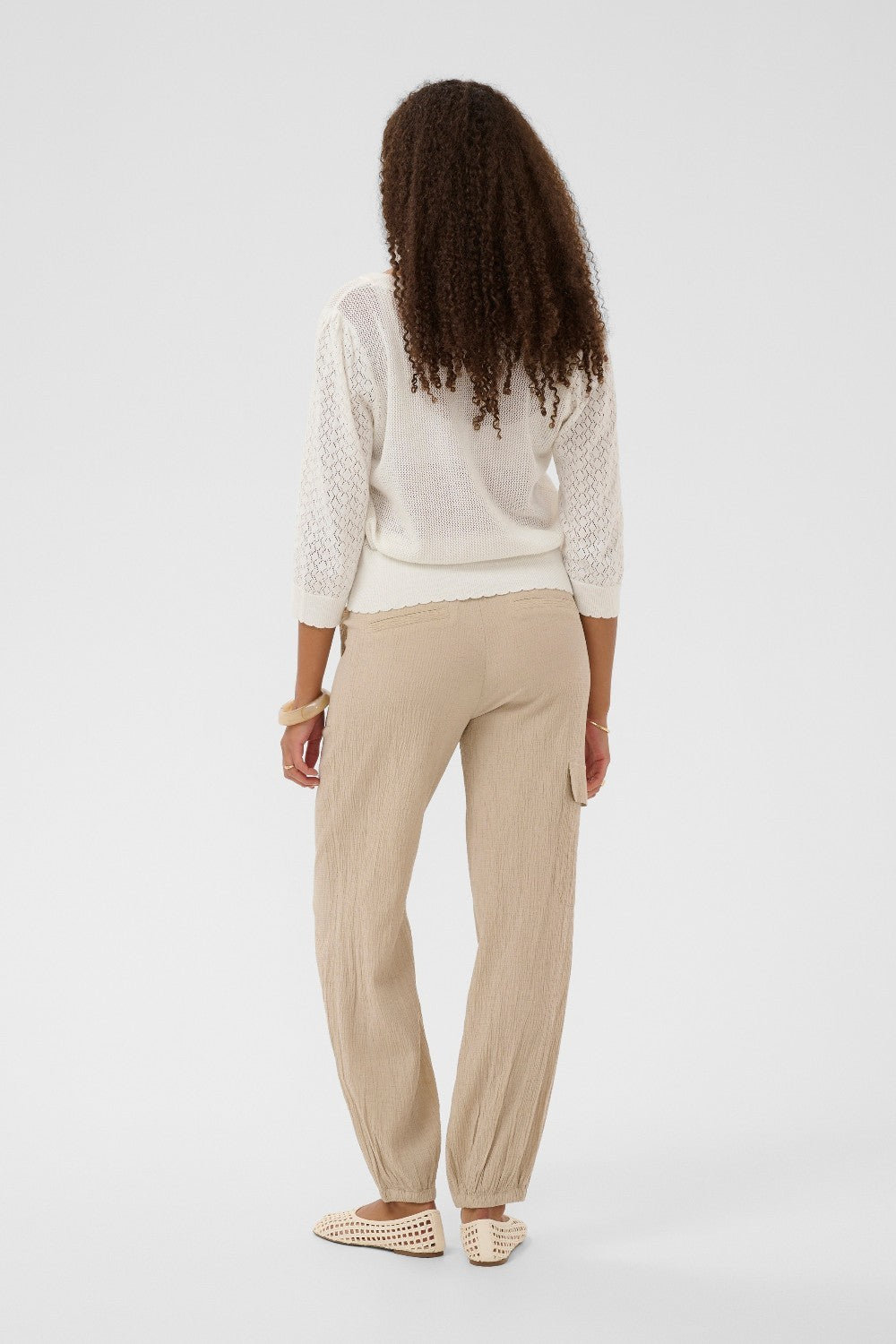 Effortless elegance meets everyday comfort in this 100% cotton cardigan. It features beautiful knit detailing and pretty buttons that add a touch of sophistication. 