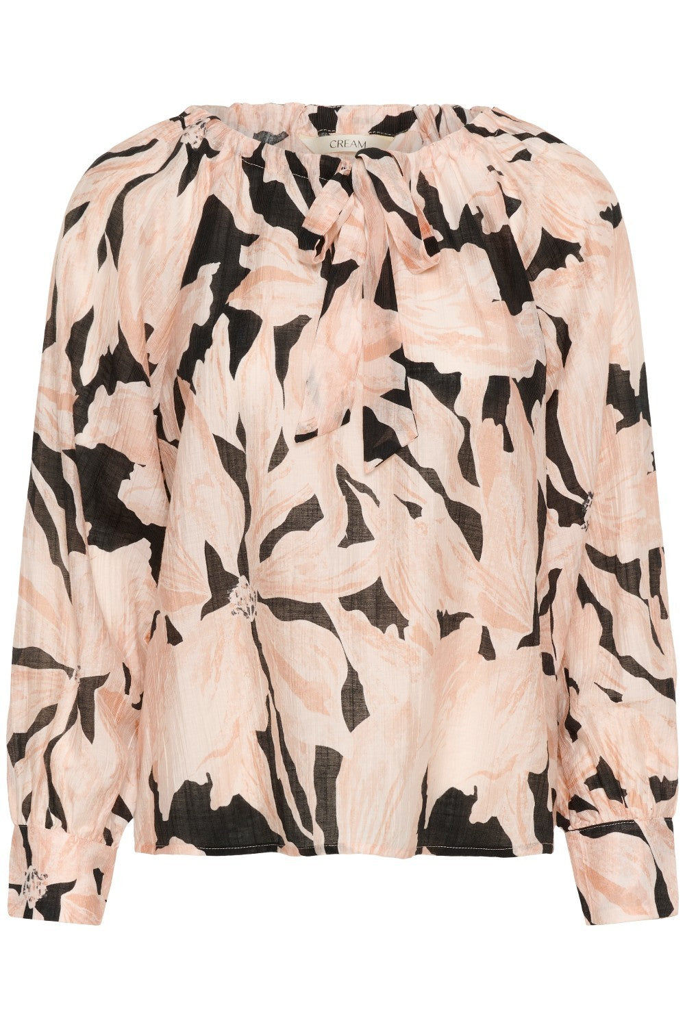 Floral patterned blouse on a white background
