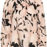 Floral patterned blouse on a white background