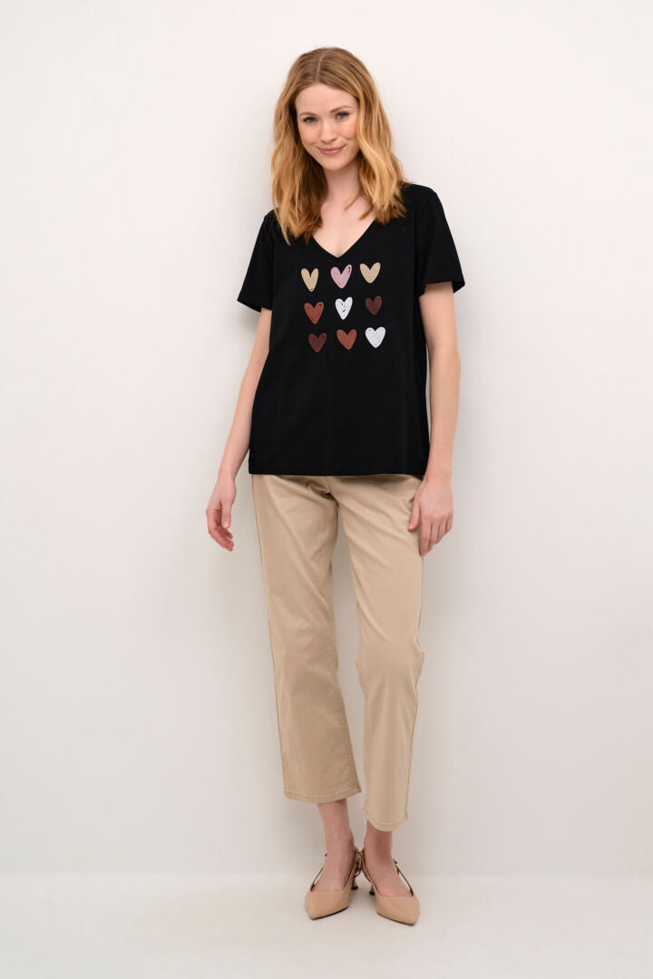 Add a touch of love to your wardrobe with our Cream Rllia T-Shirt. Made with soft cotton, this black v-neck tee features a playful heart motif. Perfect for casual days or dressing up with a twist of humour.