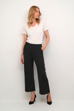 The Cream Saila Jersey Pant offers comfortable and effortless style with its pitch black colour, wide leg fit, and slip on comfort waist. Its pin tuck detailing and convenient pockets make them a versatile and functional addition to any wardrobe.