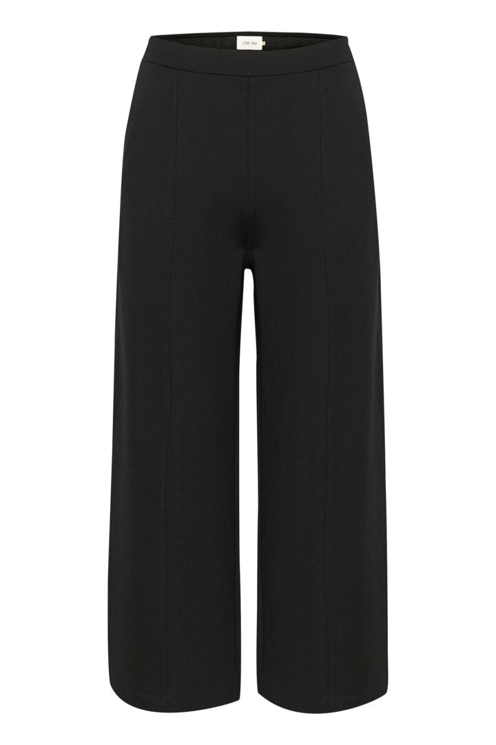 The Cream Saila Jersey Pant offers comfortable and effortless style with its pitch black colour, wide leg fit, and slip on comfort waist. Its pin tuck detailing and convenient pockets make them a versatile and functional addition to any wardrobe.
