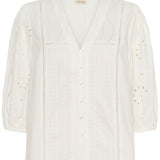 White blouse on a white background