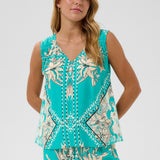Brighten your summer wardrobe with the Cream Tiah Top—a cheerful piece featuring a flattering double-V neckline and tie detail at the back. 