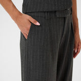 Dark gray pinstripe suit with a vest on a white background