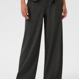 Person wearing a gray pinstripe suit on a white background
