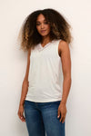 Look chic and stay comfy in this Cream Trulla Top! It's perfect for all-day wear. Its classic, neutral color will guarantee you an effortless look.