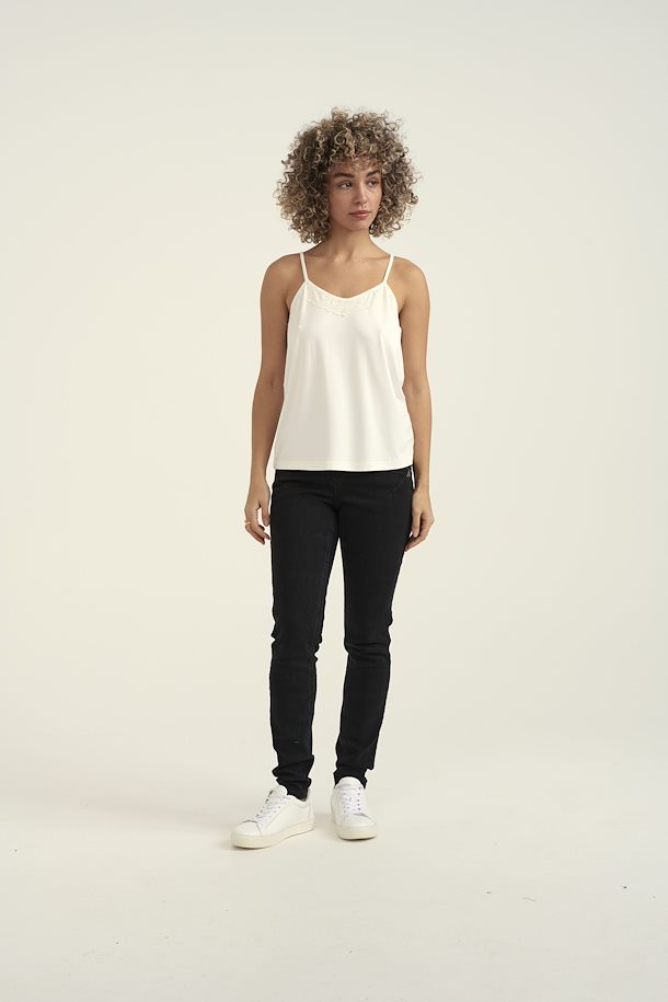 This jersey top features a slim fit with a hip length and is crafted of 95% Viscose and 5% Elastane for breathability and stretch. It also has a lace back detail.
