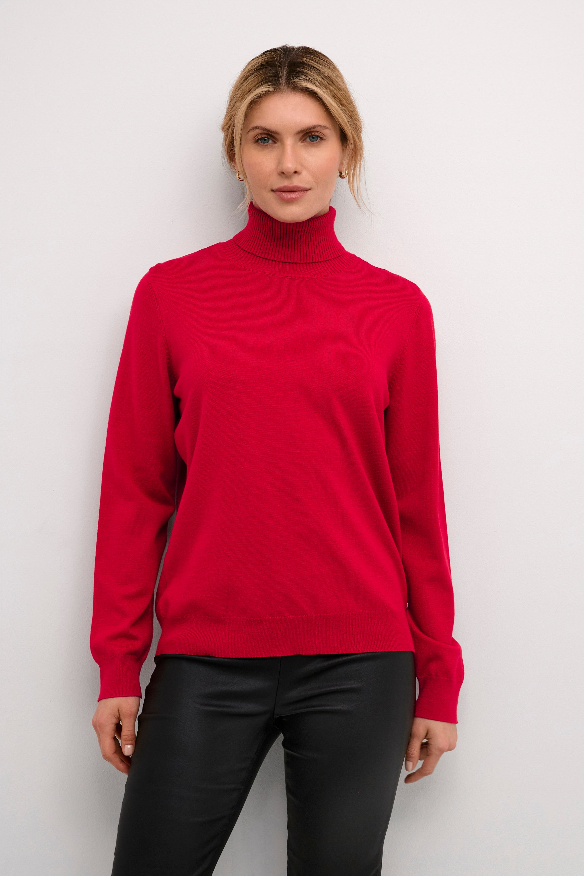 As a classic staple, the Cream Villea Knit Rollneck Sweater is perfect for layering. Crafted with high-quality materials, this versatile piece offers warmth and style for any occasion. Its timeless design makes it a must-have in any wardrobe.