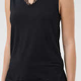 A sleeveless black V-neck top with black lace trim along the neckline and hem, shown on a model against a light gray background.