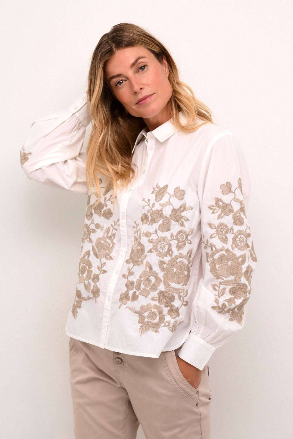 Introducing the Cream Daisy Shirt, a classic Cream style that combines timeless elegance with modern charm. Made from 100% cotton, this shirt boasts a gorgeous embroidered floral pattern that adds a touch of femininity. Perfect for most occasions, this shirt is a must-have addition to your wardrobe.