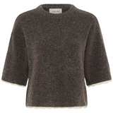 A dark brown textured knit sweater with three-quarter sleeves and a subtle scalloped edge, shown against a plain white background.
