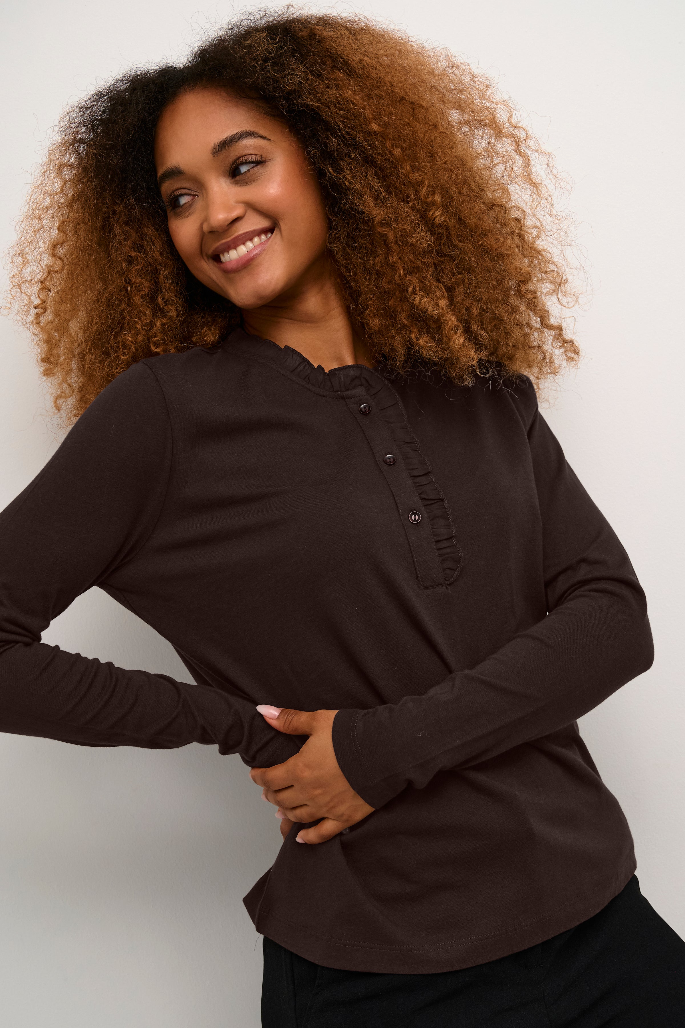 This Cream Naia Flounce Blouse is a must-have for any wardrobe. Made from high-quality Naia fabric, it offers both comfort and style. With a flouncy design and elegant cream colour, this blouse is perfect for both casual and formal occasions. Upgrade your wardrobe with this versatile and timeless piece.