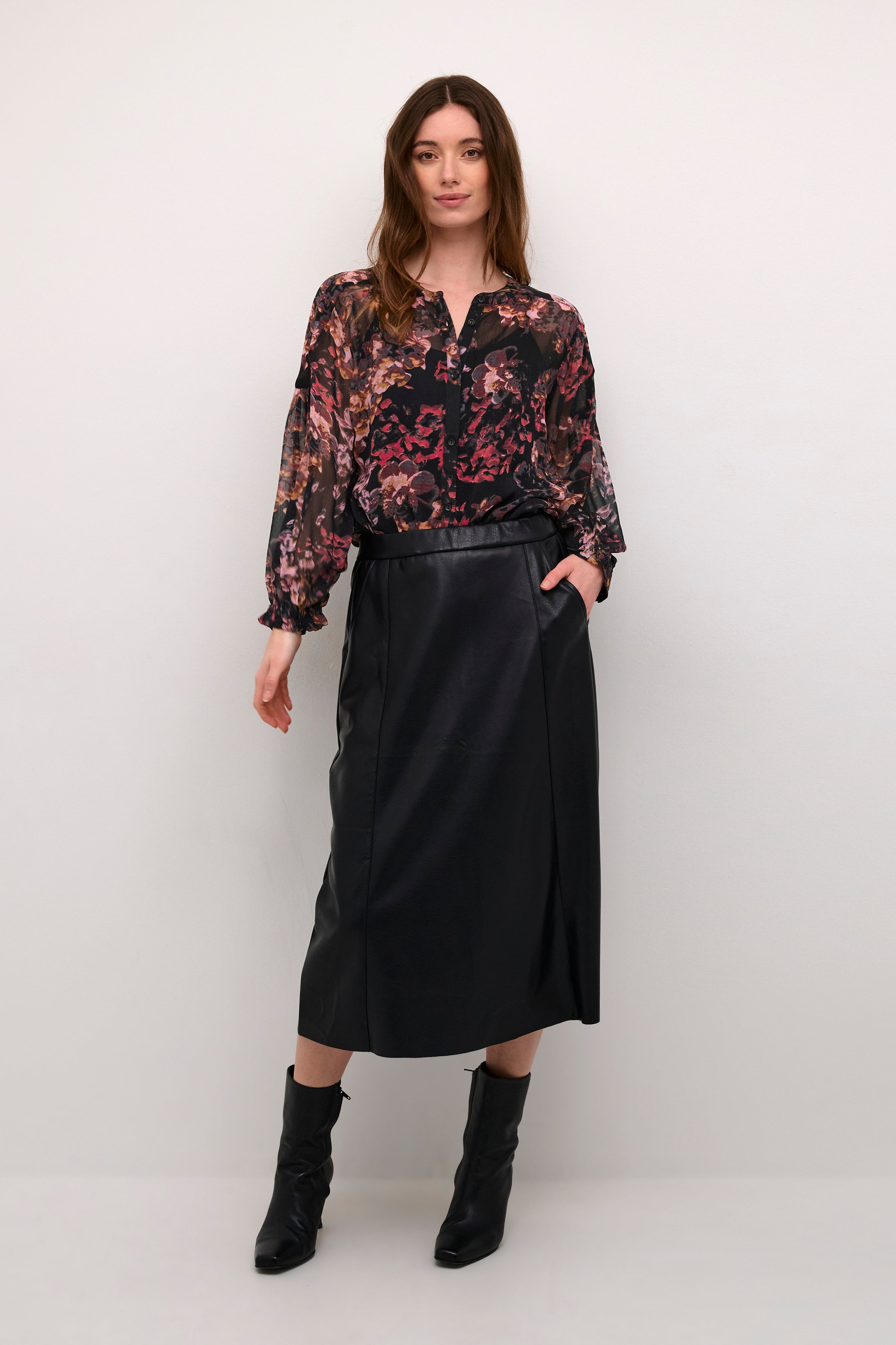 The Cream Annu Blouse - a versatile piece for any wardrobe. Add a touch of cream (err, I mean class) to any outfit. Perfect for work, play, or a combination of both. Don't be surprised if people start asking where you got it. (Wink, wink.)
