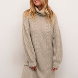 Indulge in the cozy and chic comfort of our Cream Pumpkin Knit Dress. Made with premium knit fabric, this dress features a flattering pumpkin shape and a neutral cream colour that pairs perfectly with any accessories. Stay stylish and warm this season with our must-have dress!
