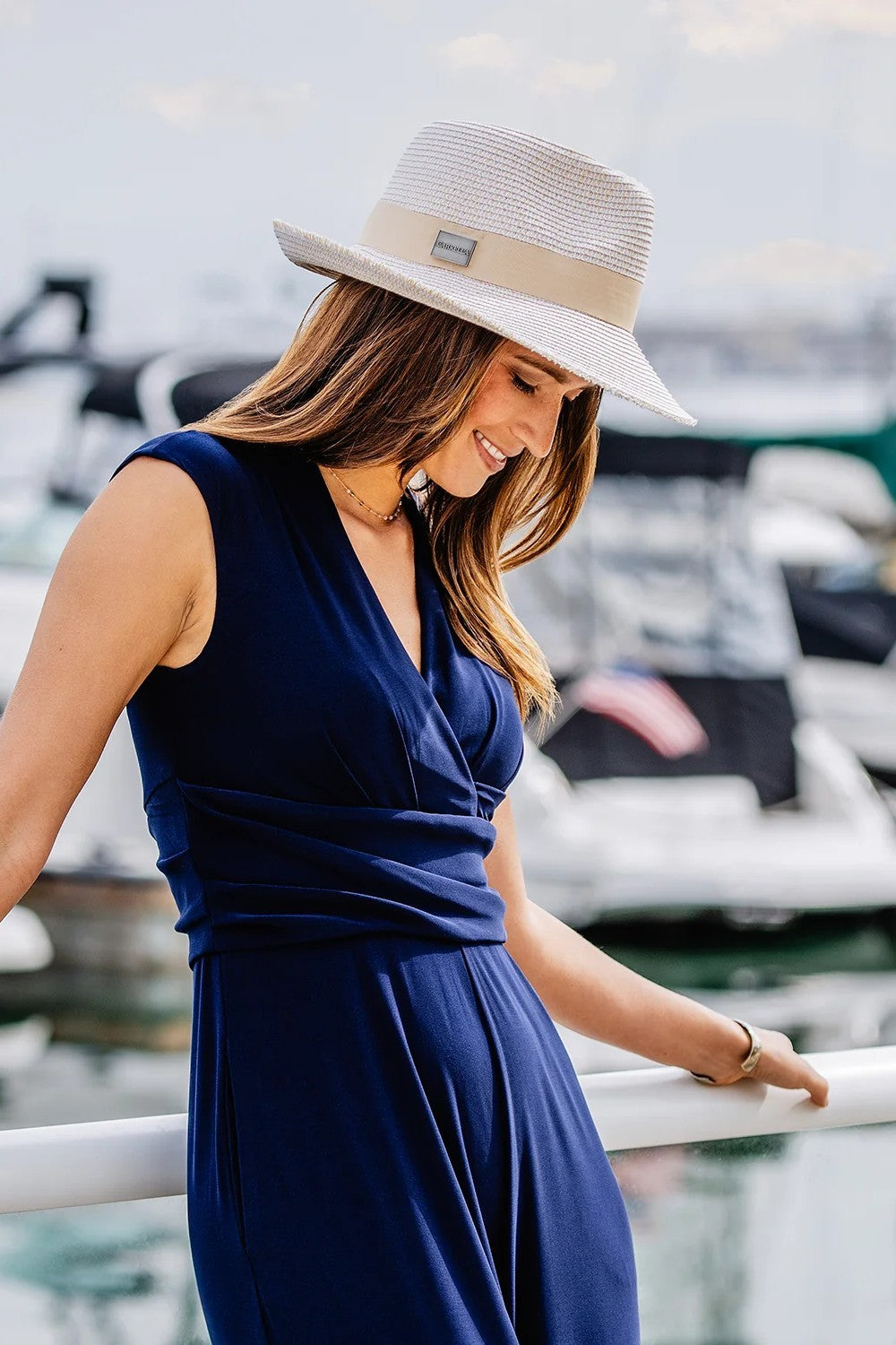 With its frayed edged brim and tone-on-tone trim, this unique fedora is a real head turner. Crafted from lightweight, UPF 50+ fabric, it promises comfort and sun protection from dawn to dusk. Stage hop at a music festival or wander a new city, with the Emery in your summer go-bag, you'll be prepared for any sunny moment.