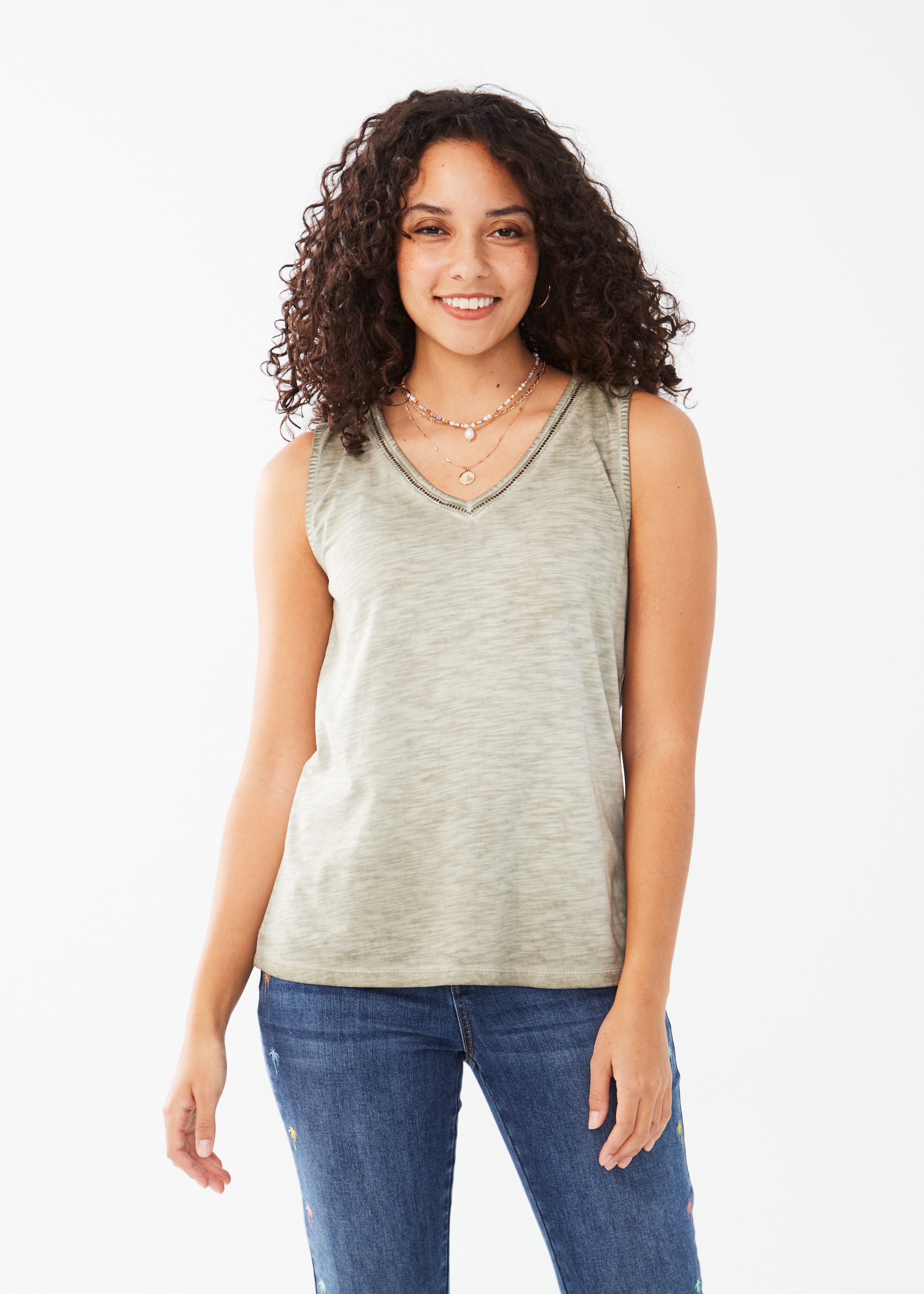 Elevate your summer wardrobe with our FDJ Sleeveless V Neck Top, available in 2 colours! 