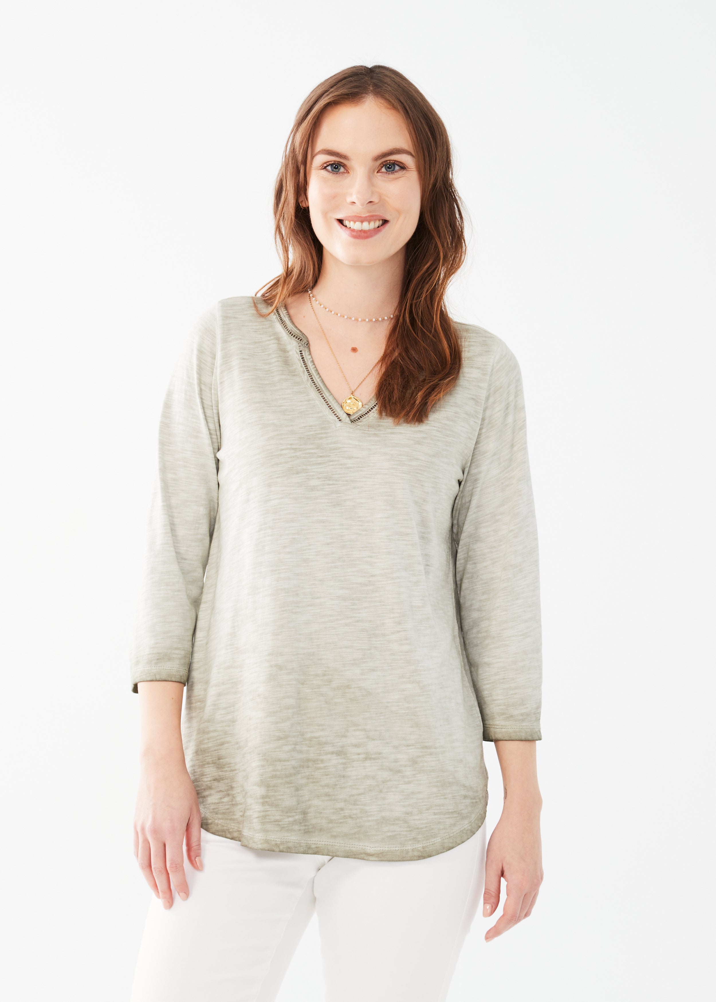 The FDJ 3/4 Sleeve Split Neck Top, available in 2 colours, is the perfect staple piece for any wardrobe!