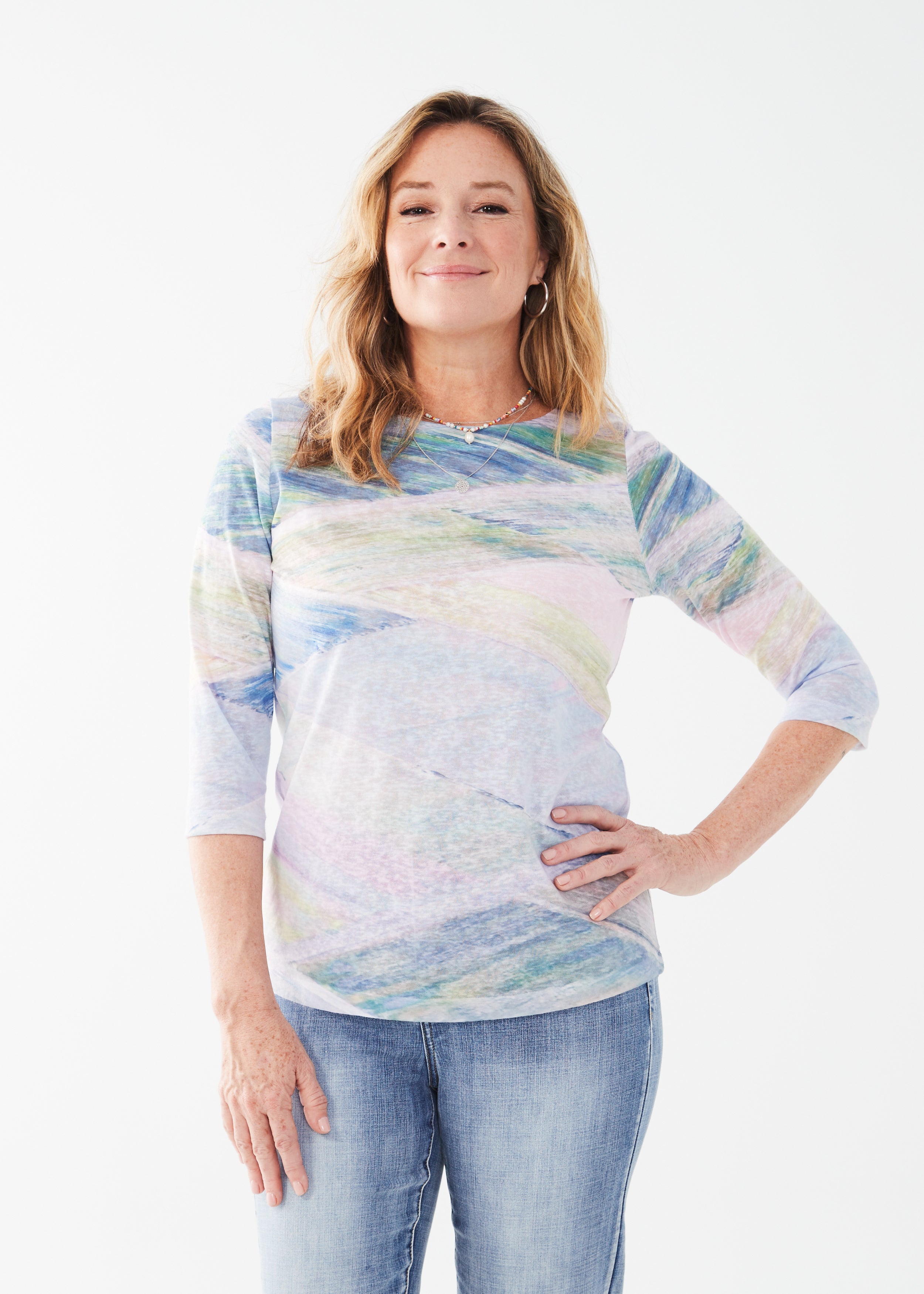 Discover the perfect balance of comfort and style with the FDJ 3/4 Sleeve BoatNeck Top. 