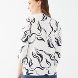 Elevate your wardrobe with the stunning FDJ Watercolour Overlay Top!