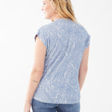 Experience the ultimate blend of style and comfort with our FDJ Printed Cap Sleeve V-Neck Top! 
