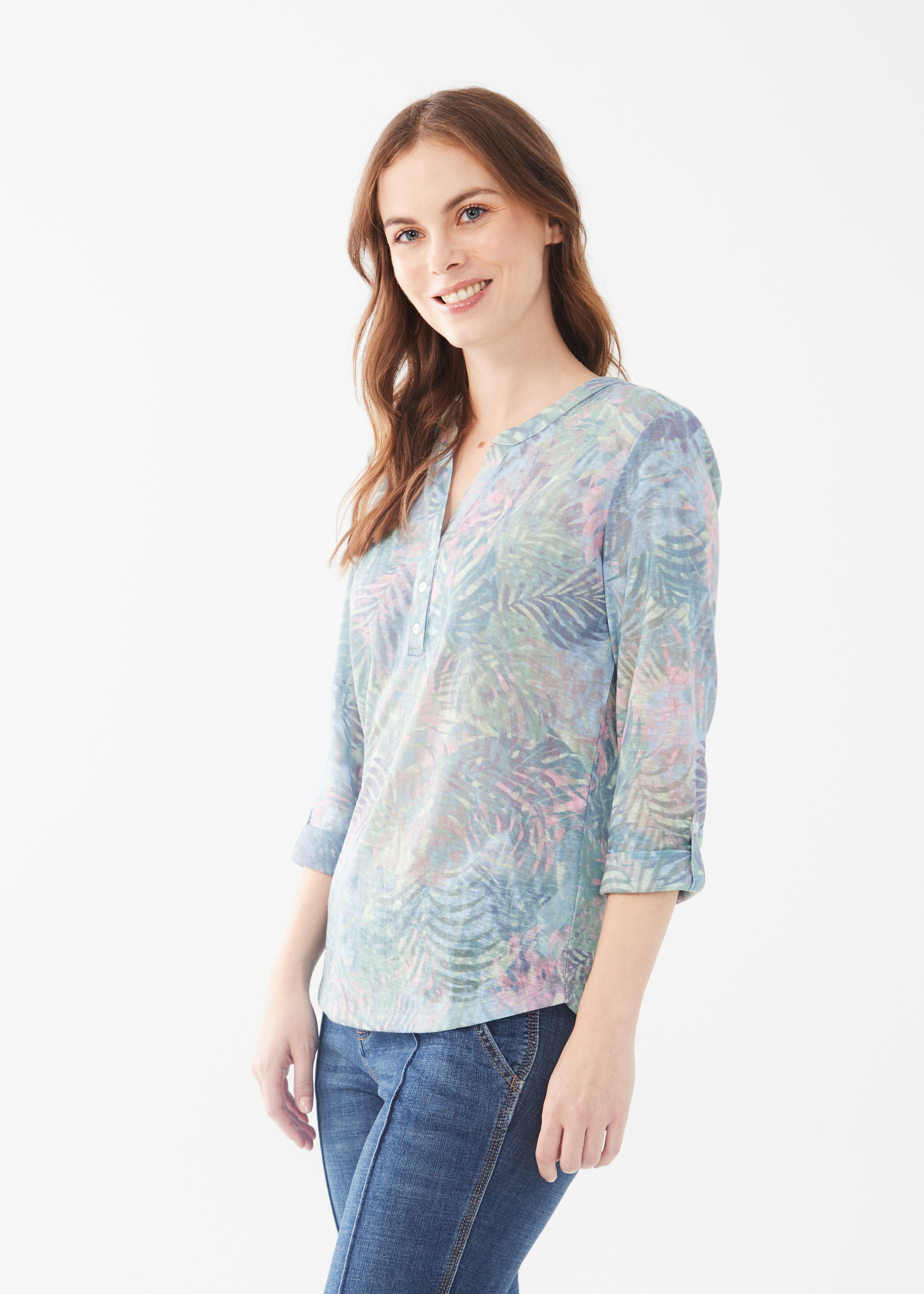 Unleash your adventurous side with our FDJ 3/4 Sleeve Tab Up Henley Top in Tropical Camo print.