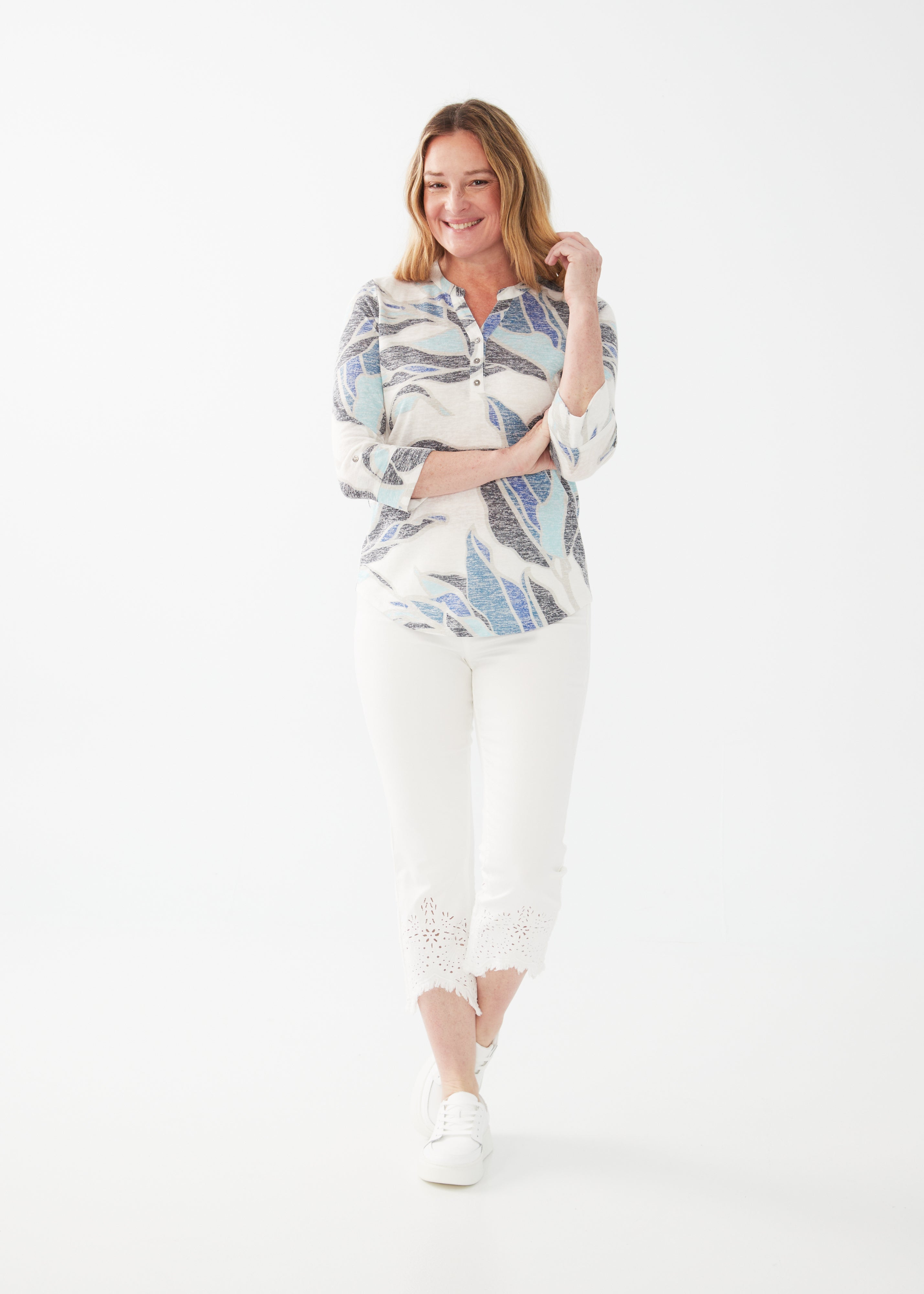 Experience the luxurious softness and comfort of our FDJ 3/4 Sleeve Henley top. With its 3/4 length sleeves and timeless henley design, this top is perfect for any occasion. Made with our unique gulla leaf pattern, you'll feel like you're wearing a piece of nature with every wear. Upgrade your wardrobe with this must-have top!