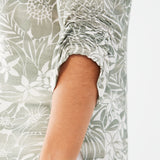 Elevate your wardrobe with our FDJ 3/4 Sleeve Shirt in a stunning tropical print. 