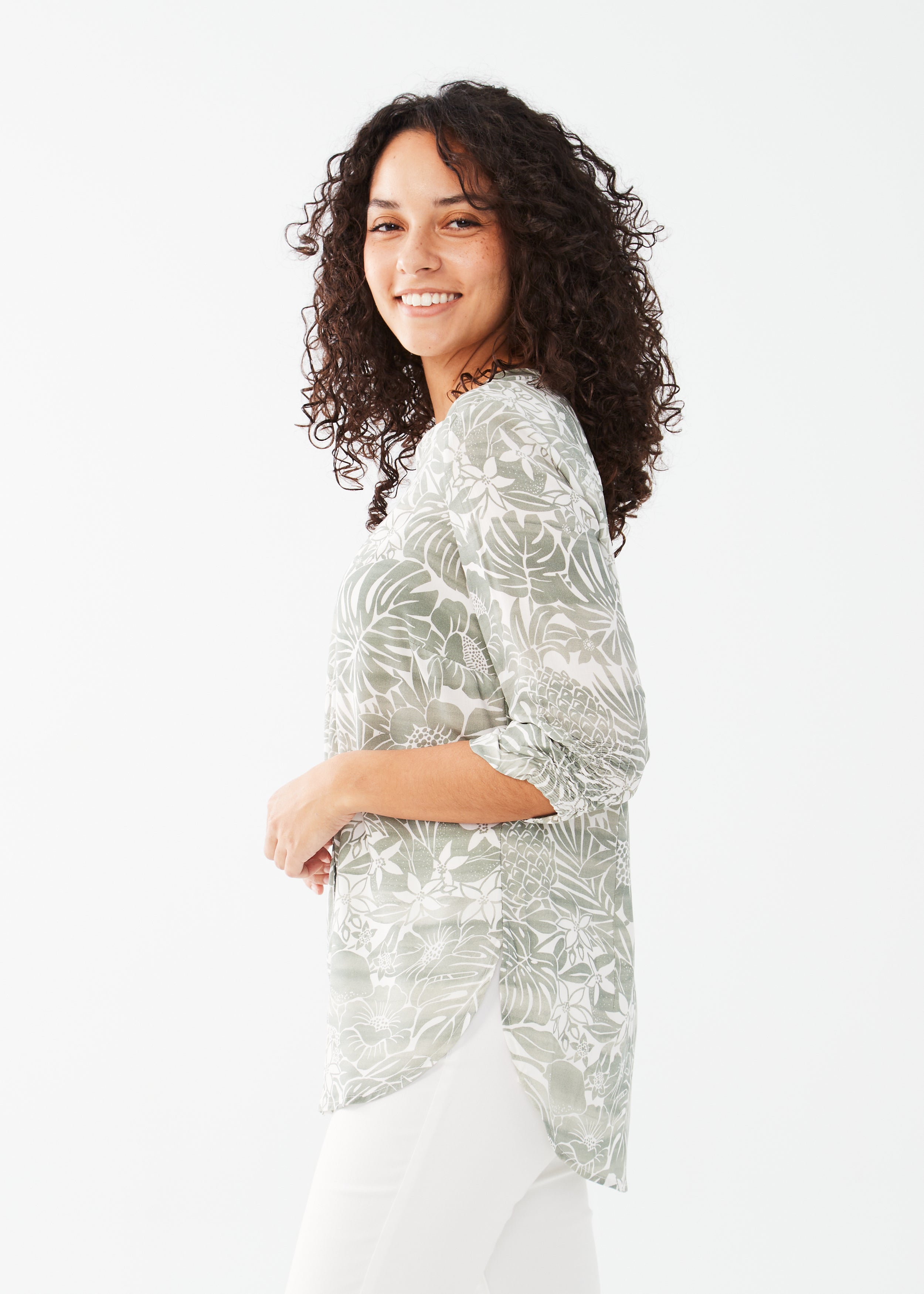 Elevate your wardrobe with our FDJ 3/4 Sleeve Shirt in a stunning tropical print. 