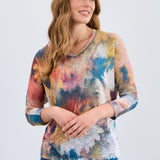 The FDJ Dolman V-Neck Top combines comfort and style with its relaxed dolman sleeves and flattering V-neck design. Made from soft, breathable fabric, it offers a comfortable fit that moves with you throughout the day. Perfect for dressing up or down, this versatile top adds a sophisticated touch to any outfit, making it a must-have addition to your wardrobe.