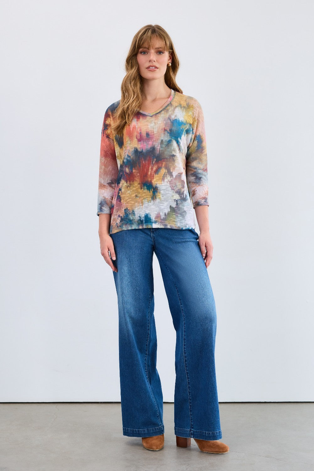 The FDJ Dolman V-Neck Top combines comfort and style with its relaxed dolman sleeves and flattering V-neck design. Made from soft, breathable fabric, it offers a comfortable fit that moves with you throughout the day. Perfect for dressing up or down, this versatile top adds a sophisticated touch to any outfit, making it a must-have addition to your wardrobe.