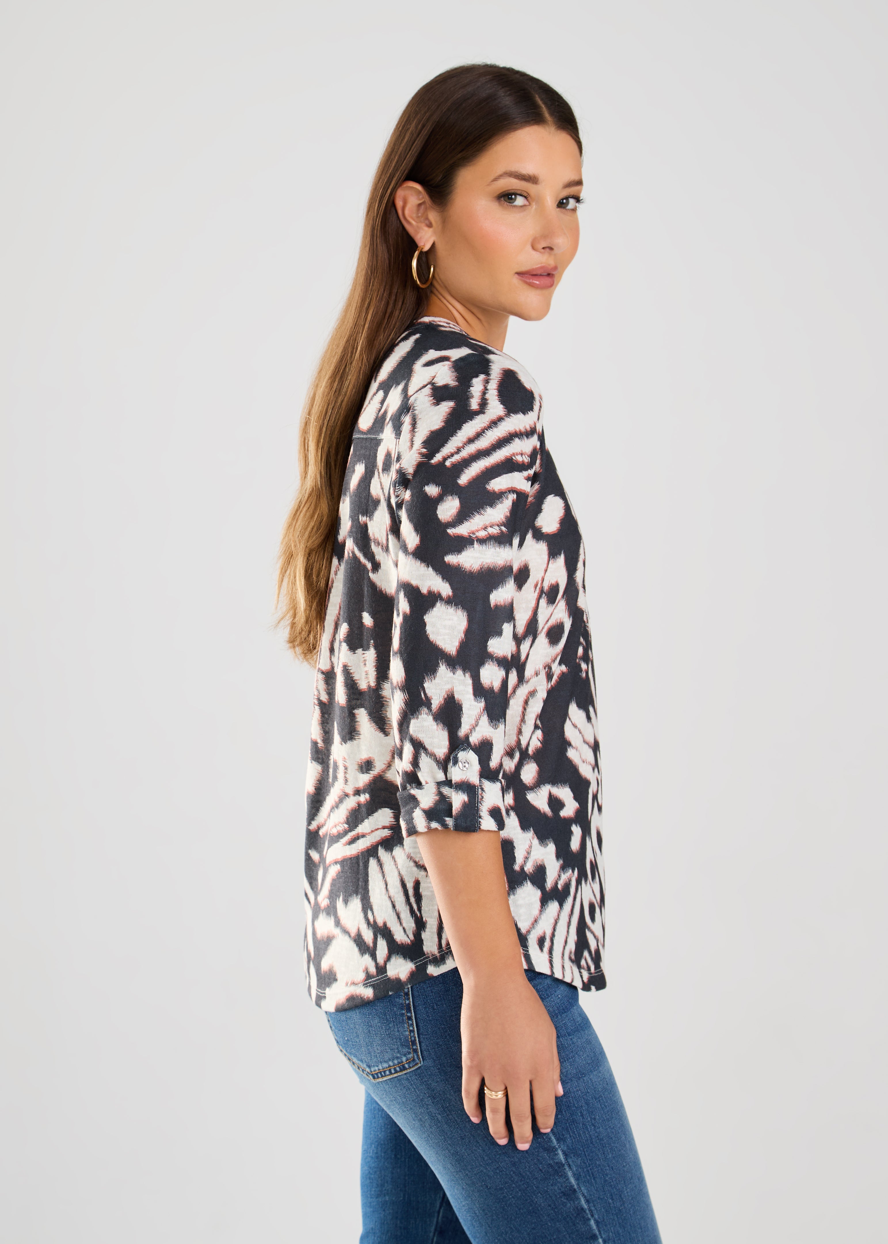 This FDJ Henley Top is royally stylish with its Monarch print. Made from 100% Polyester, it offers a comfortable and lightweight look for any occasion. Rule the fashion game with this playful piece.&nbsp;