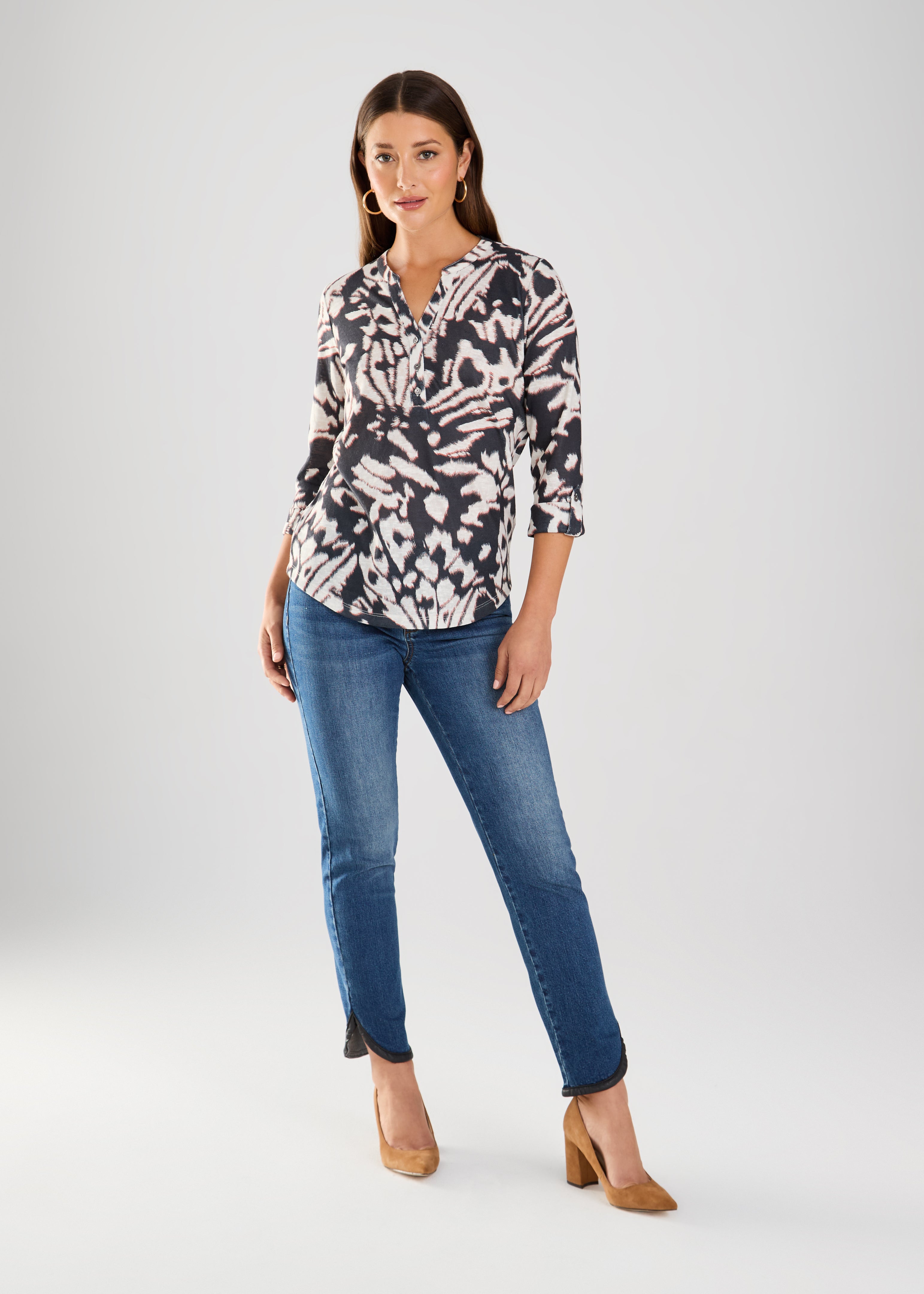 This FDJ Henley Top is royally stylish with its Monarch print. Made from 100% Polyester, it offers a comfortable and lightweight look for any occasion. Rule the fashion game with this playful piece.&nbsp;