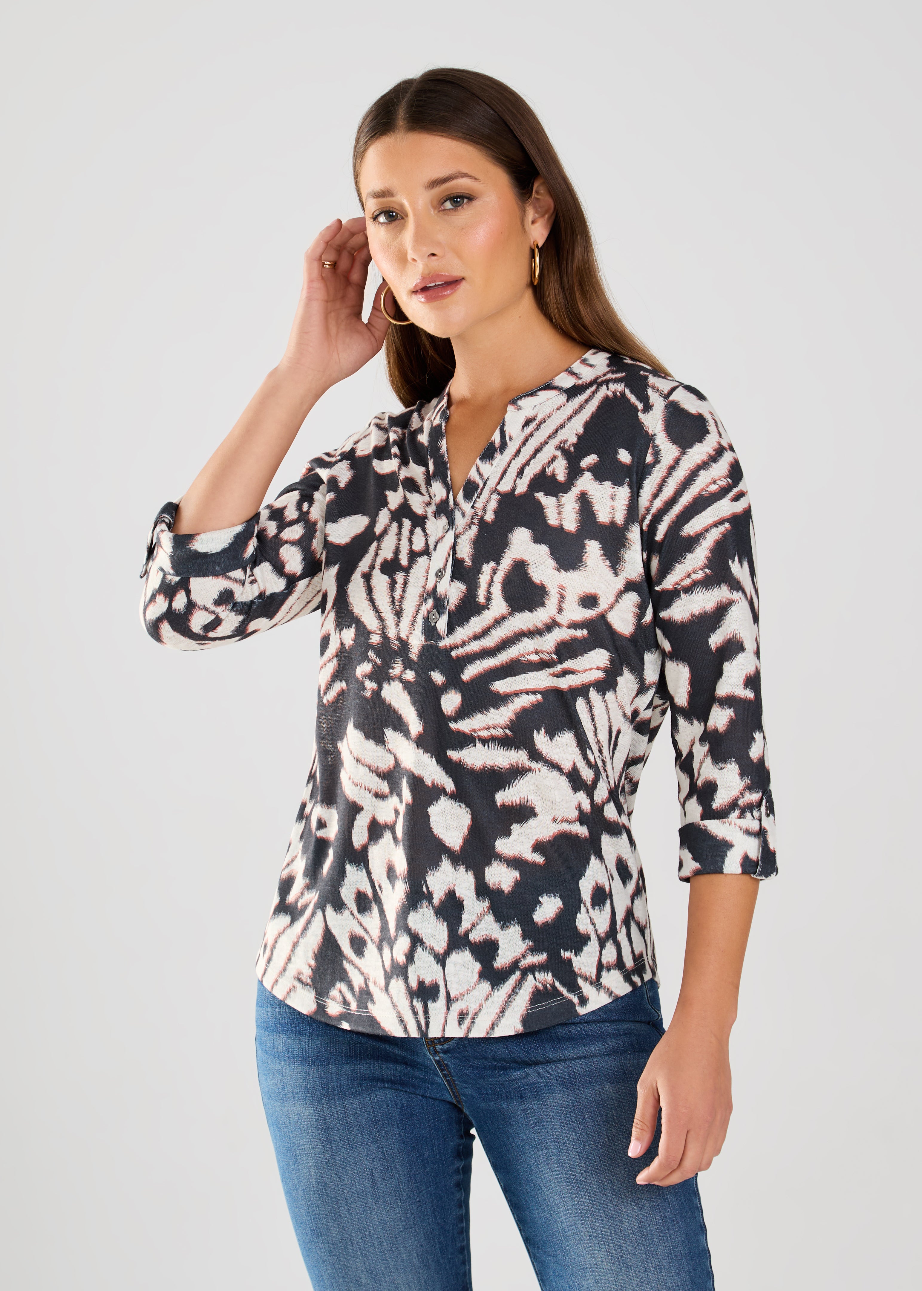 This FDJ Henley Top is royally stylish with its Monarch print. Made from 100% Polyester, it offers a comfortable and lightweight look for any occasion. Rule the fashion game with this playful piece.&nbsp;