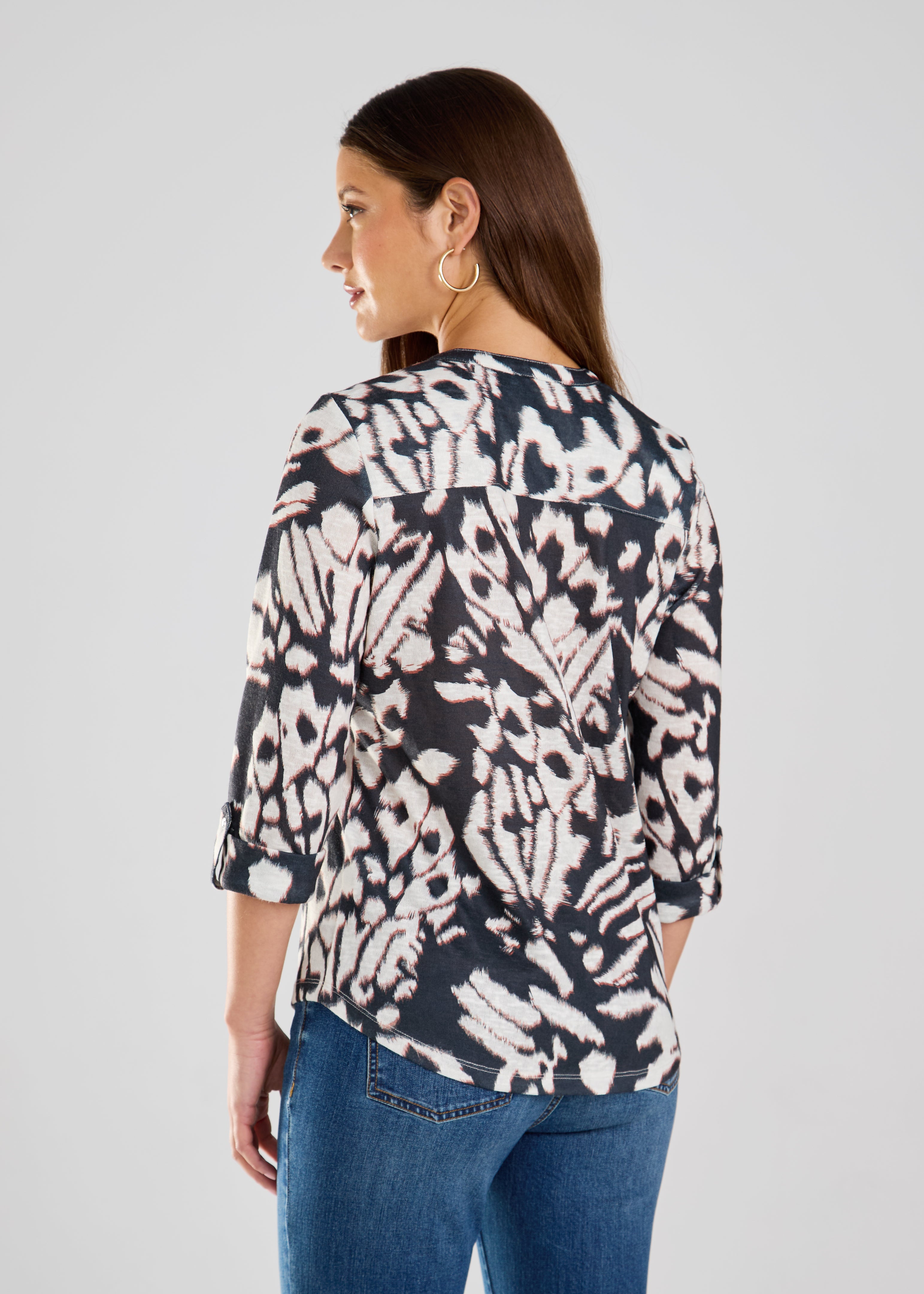 This FDJ Henley Top is royally stylish with its Monarch print. Made from 100% Polyester, it offers a comfortable and lightweight look for any occasion. Rule the fashion game with this playful piece.&nbsp;