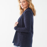 Crafted with a soft structure, the FDJ Knit Blazer in navy offers a tailored yet comfortable fit. Featuring a one button closure and deep, functional front pockets, this blazer is perfect for all-day wear. Elevate your style and confidence with this versatile and stylish blazer.