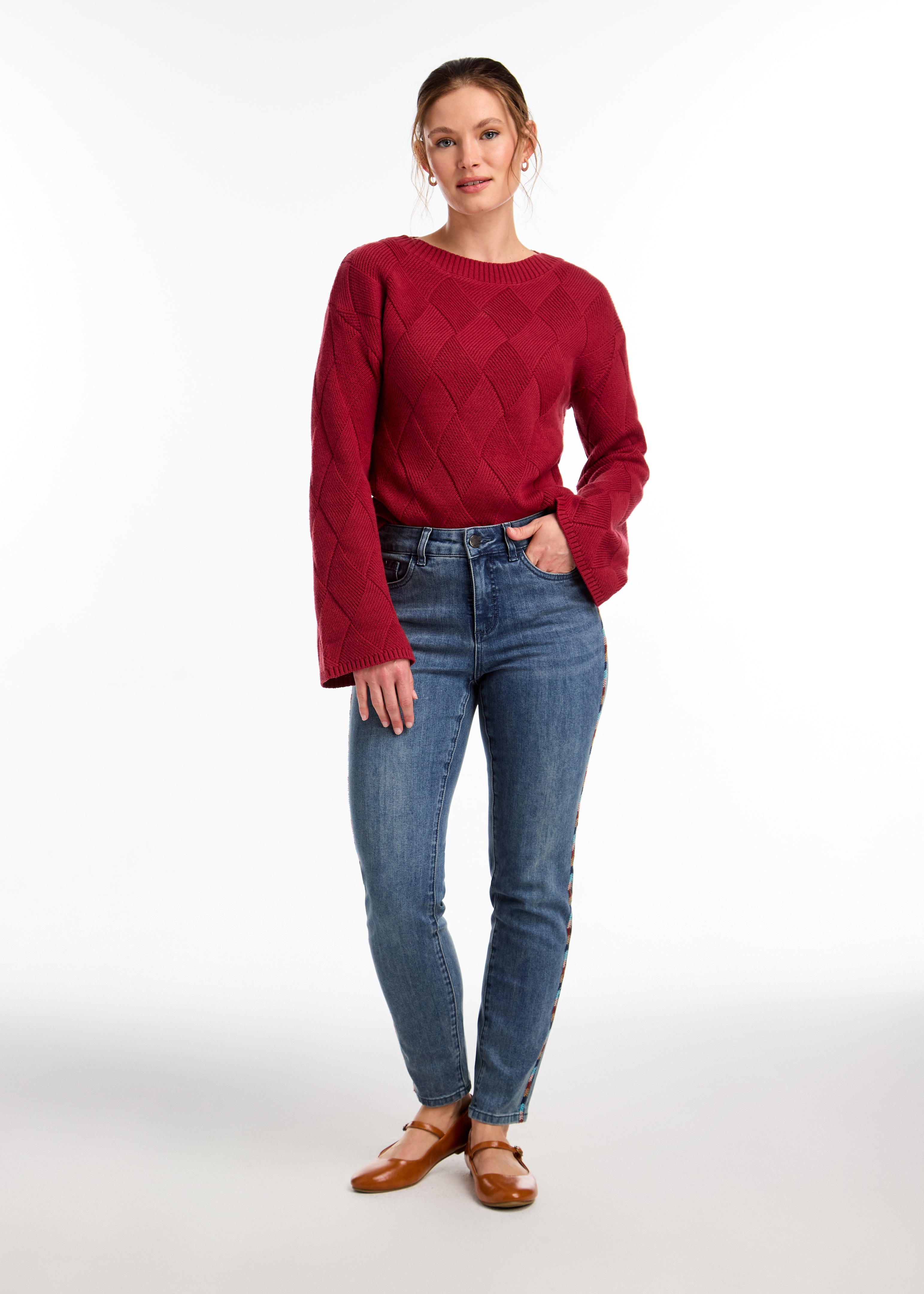 Discover the perfect blend of modern and classic with our textured knit sweater. With bell sleeves and dropped shoulders, it's a cold-weather must-have.