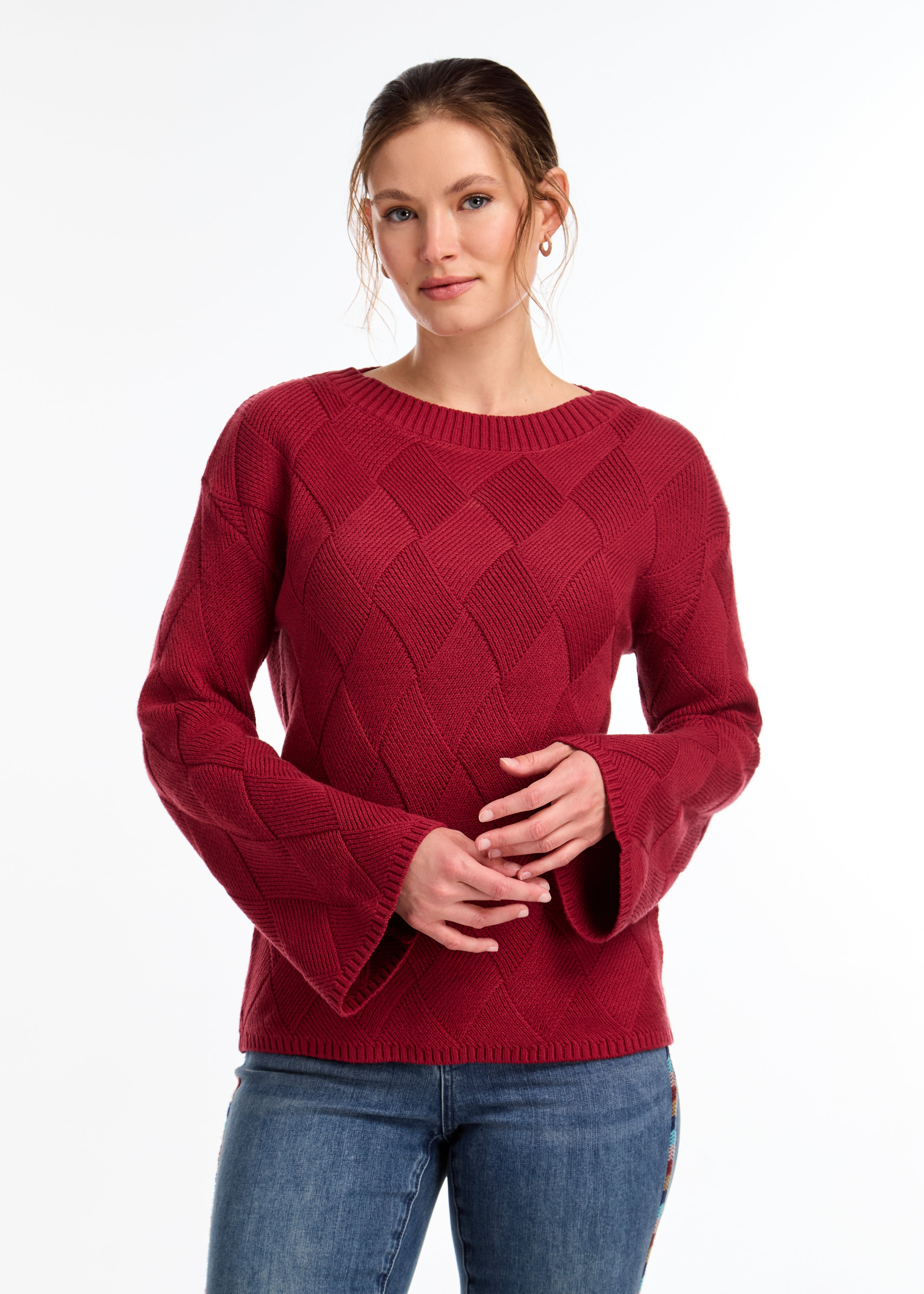 Discover the perfect blend of modern and classic with our textured knit sweater. With bell sleeves and dropped shoulders, it's a cold-weather must-have.