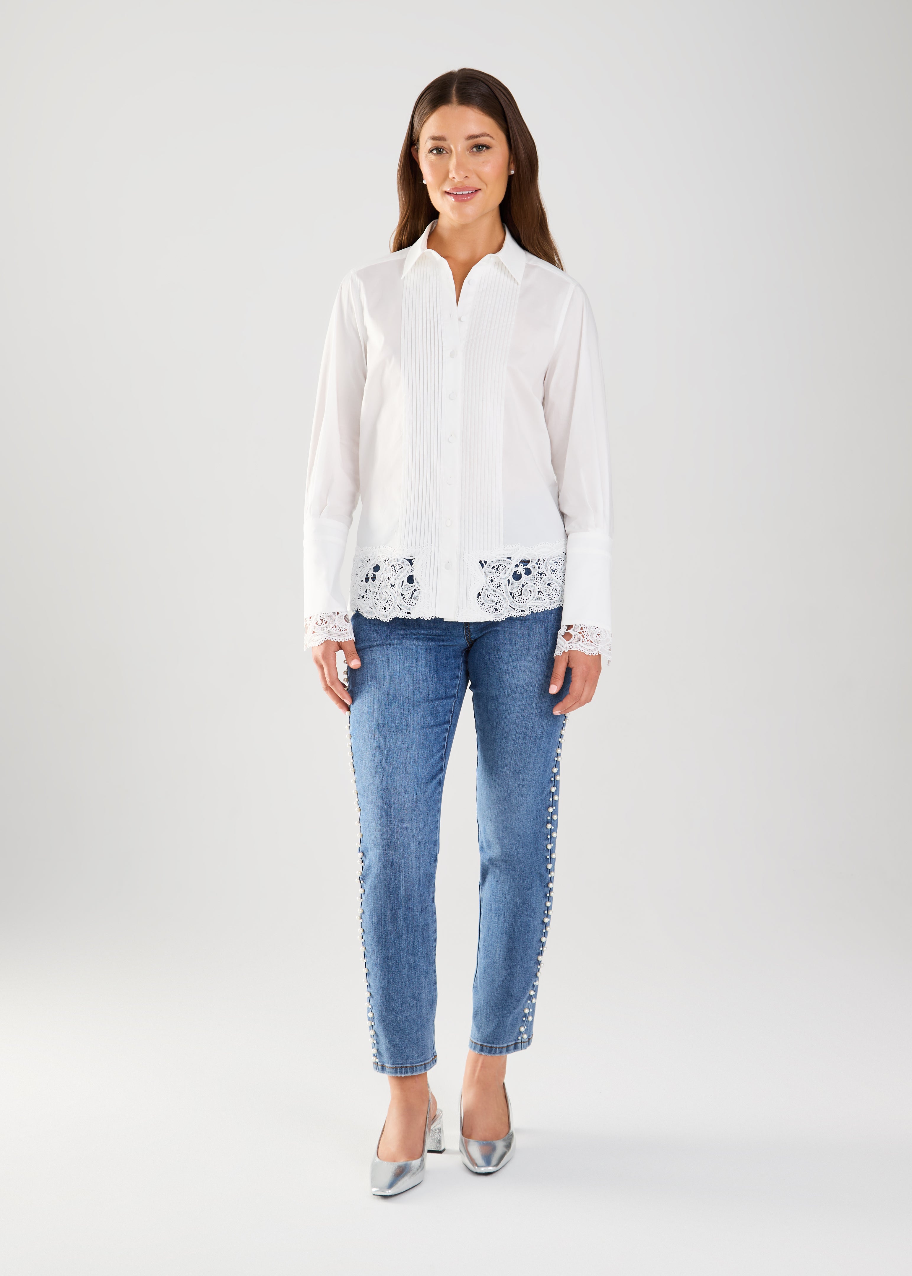 Expertly crafted with a timeless design, the FDJ Long Sleeve Lace Detail Shirt effortlessly elevates any outfit. With a perfect blend of cotton and stretch, this beautiful shirt offers both style and comfort. Perfect for dressing up or keeping casual, it's a versatile addition to any wardrobe.