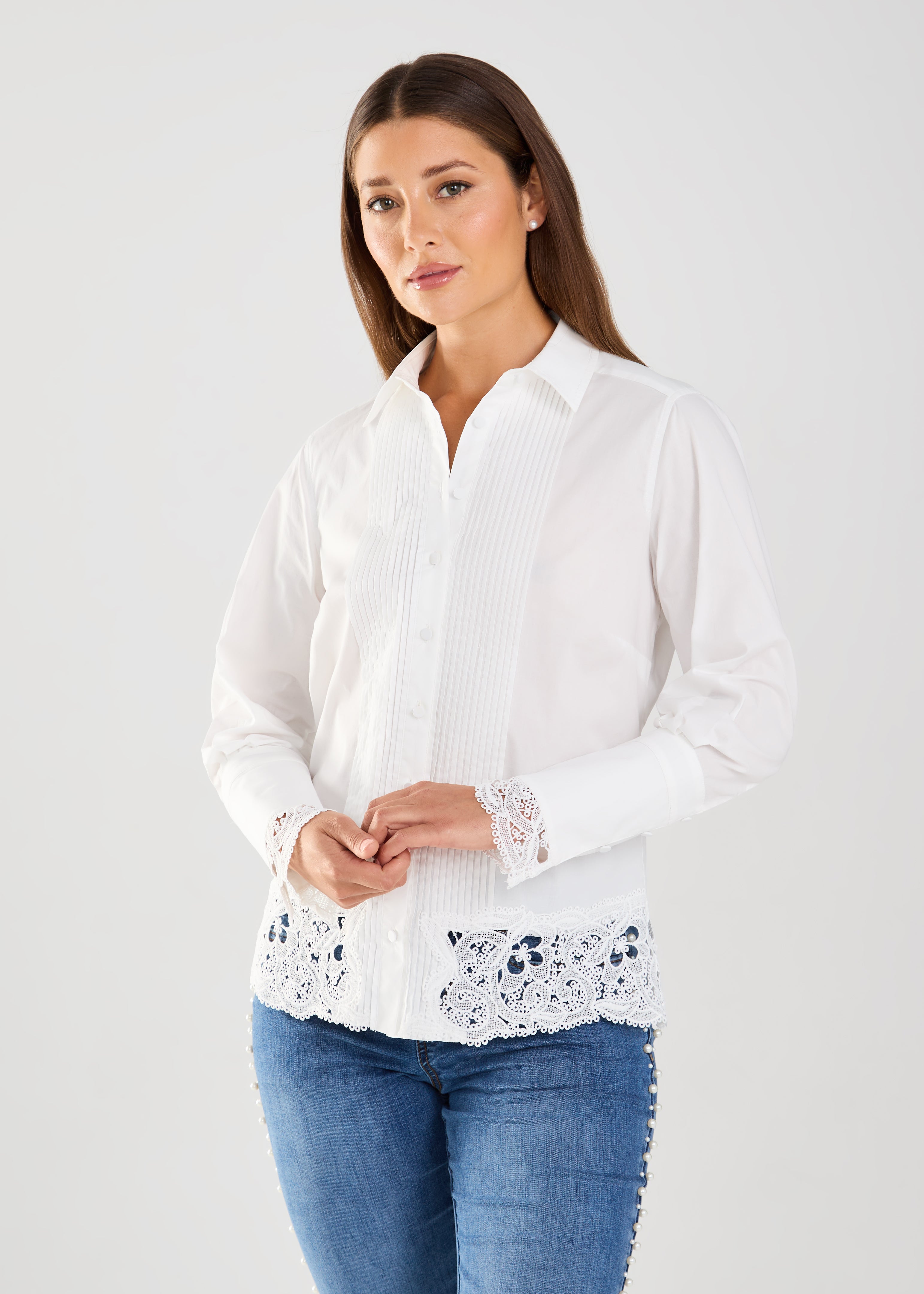 Expertly crafted with a timeless design, the FDJ Long Sleeve Lace Detail Shirt effortlessly elevates any outfit. With a perfect blend of cotton and stretch, this beautiful shirt offers both style and comfort. Perfect for dressing up or keeping casual, it's a versatile addition to any wardrobe.