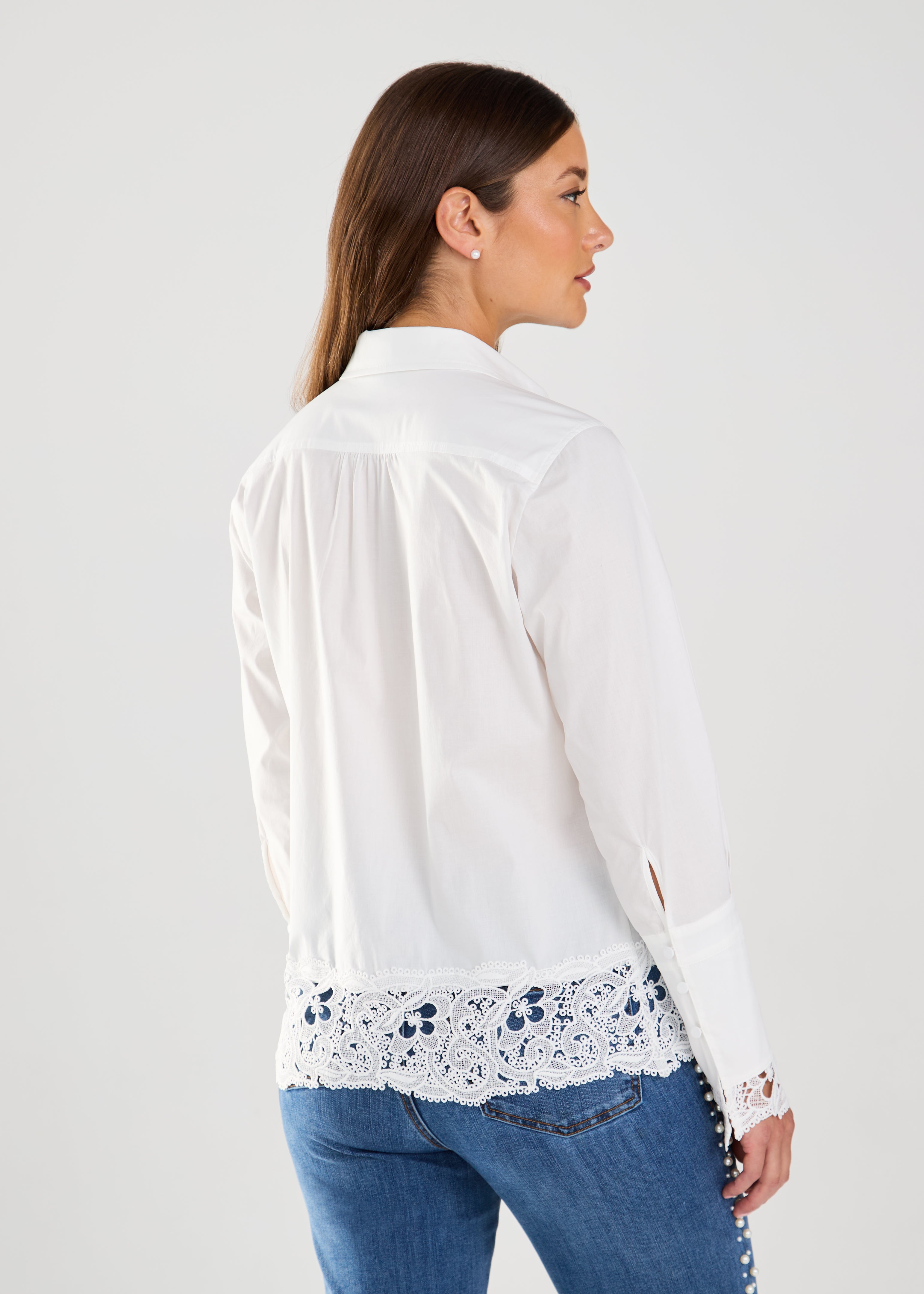 Expertly crafted with a timeless design, the FDJ Long Sleeve Lace Detail Shirt effortlessly elevates any outfit. With a perfect blend of cotton and stretch, this beautiful shirt offers both style and comfort. Perfect for dressing up or keeping casual, it's a versatile addition to any wardrobe.