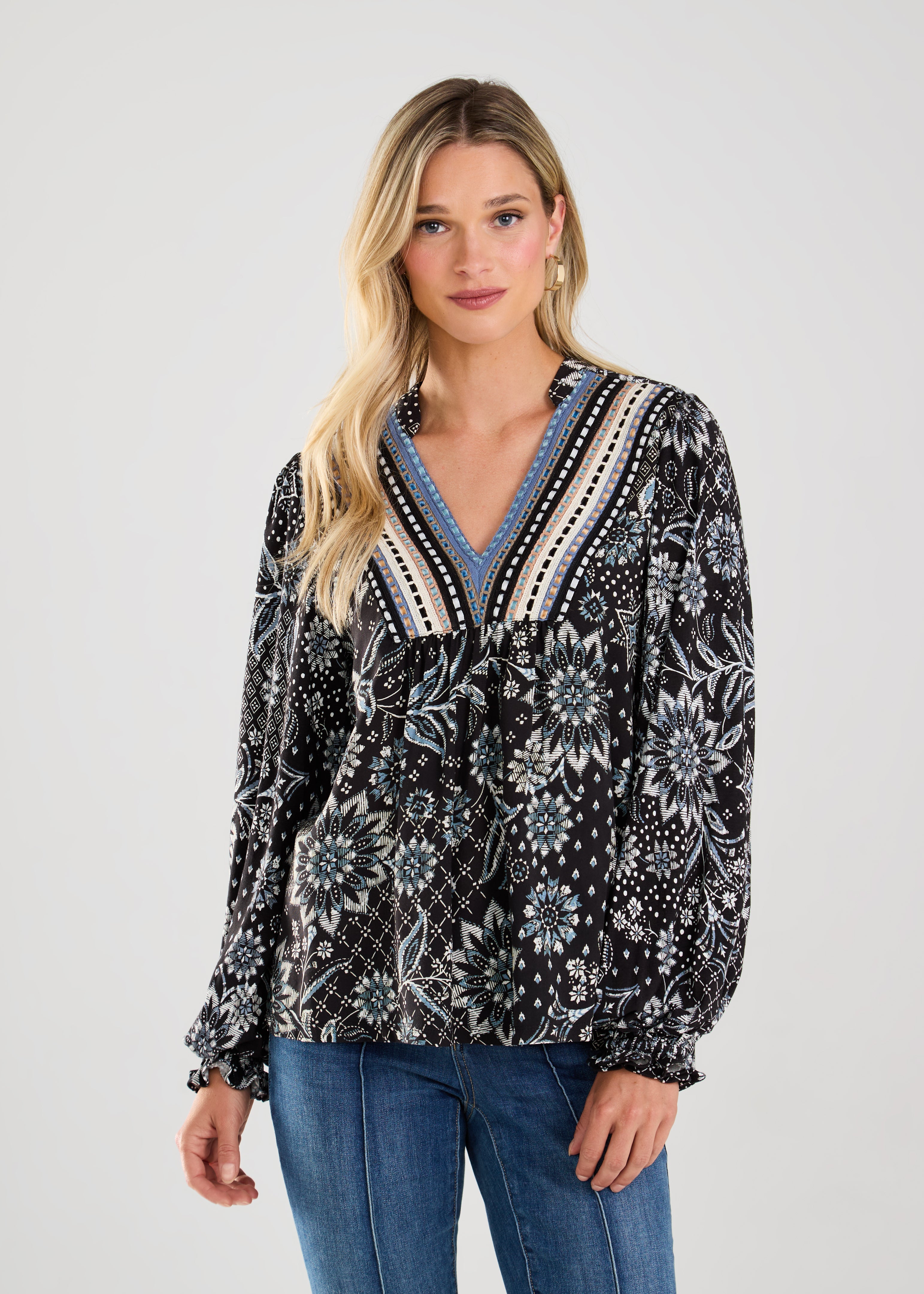 This boho blouse combines feminine flair with a touch of vintage-inspired style for a truly unique piece.