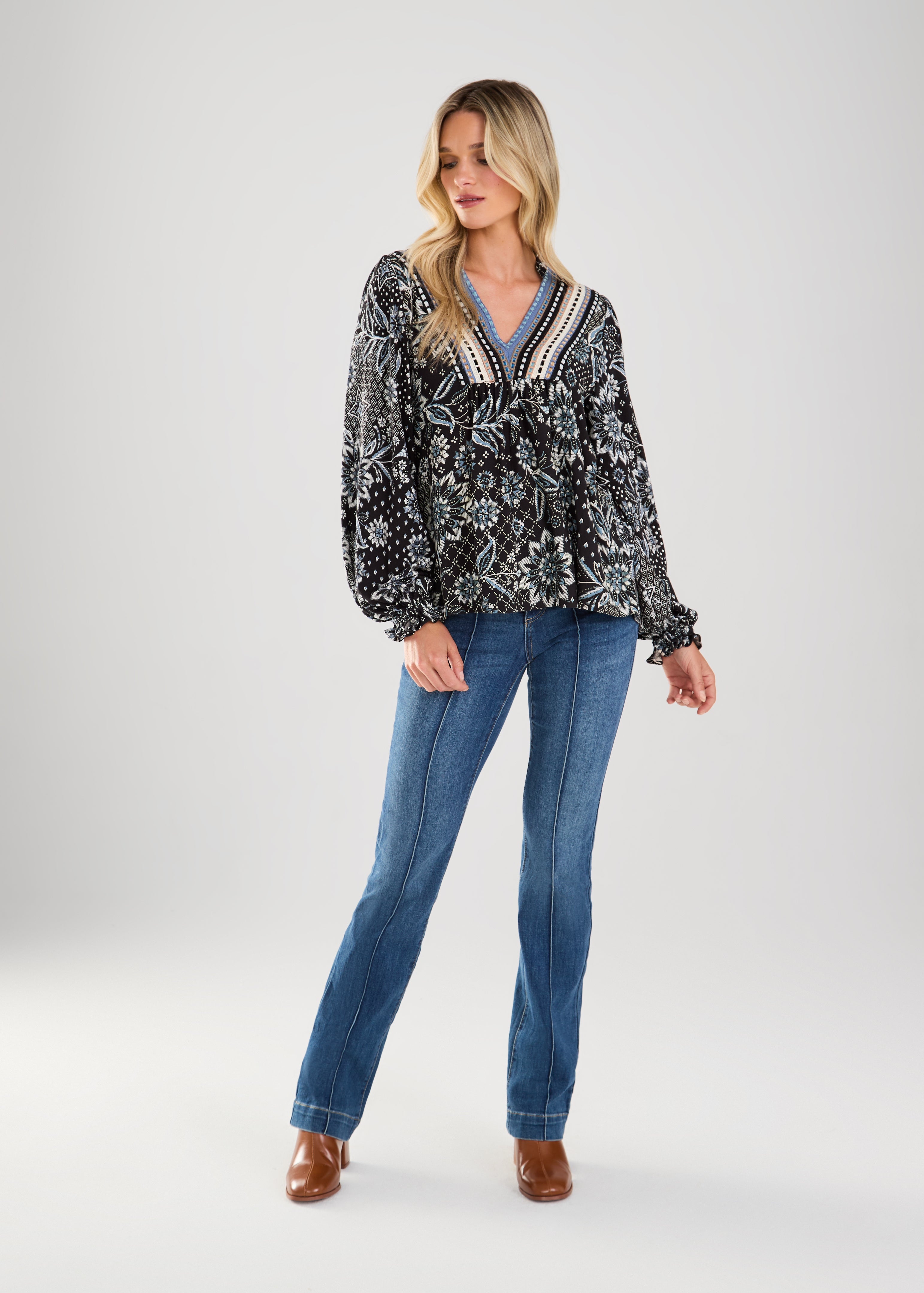 This boho blouse combines feminine flair with a touch of vintage-inspired style for a truly unique piece.